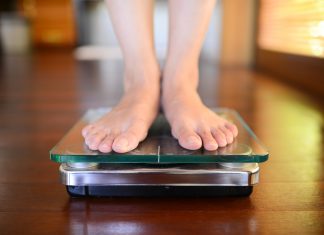 Standing On Weight Scale